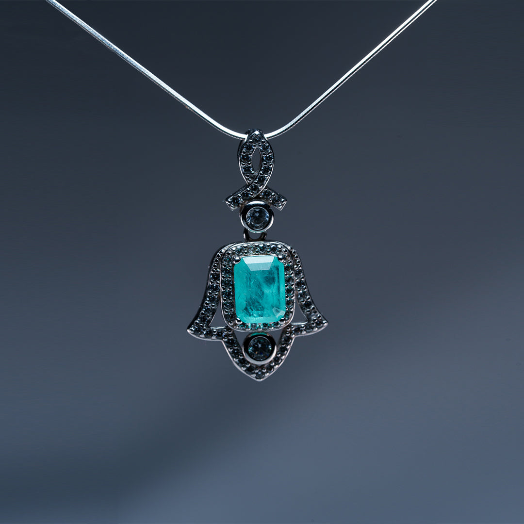Amulet of Light pendant at angle showing sacred talisman symbolism and harmonizing energy