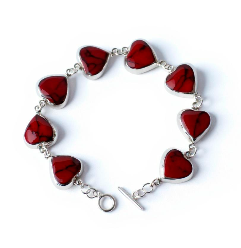 Heart of Fire silver bracelet with eight Red Spider Cat heart stones, front view