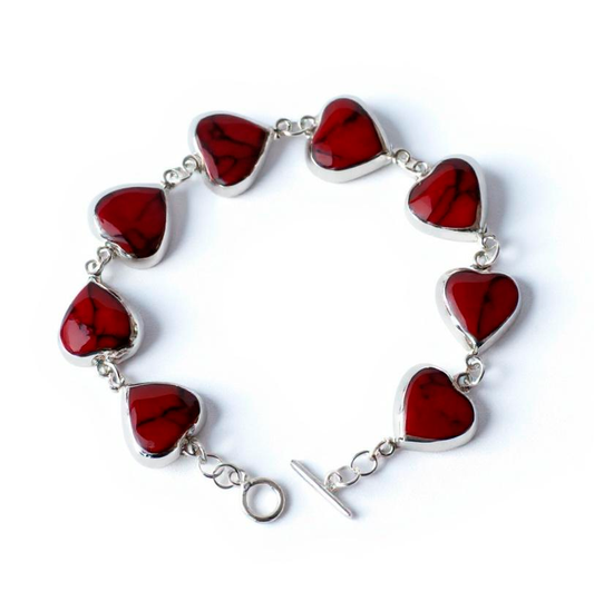 Heart of Fire silver bracelet with eight Red Spider Cat heart stones, front view