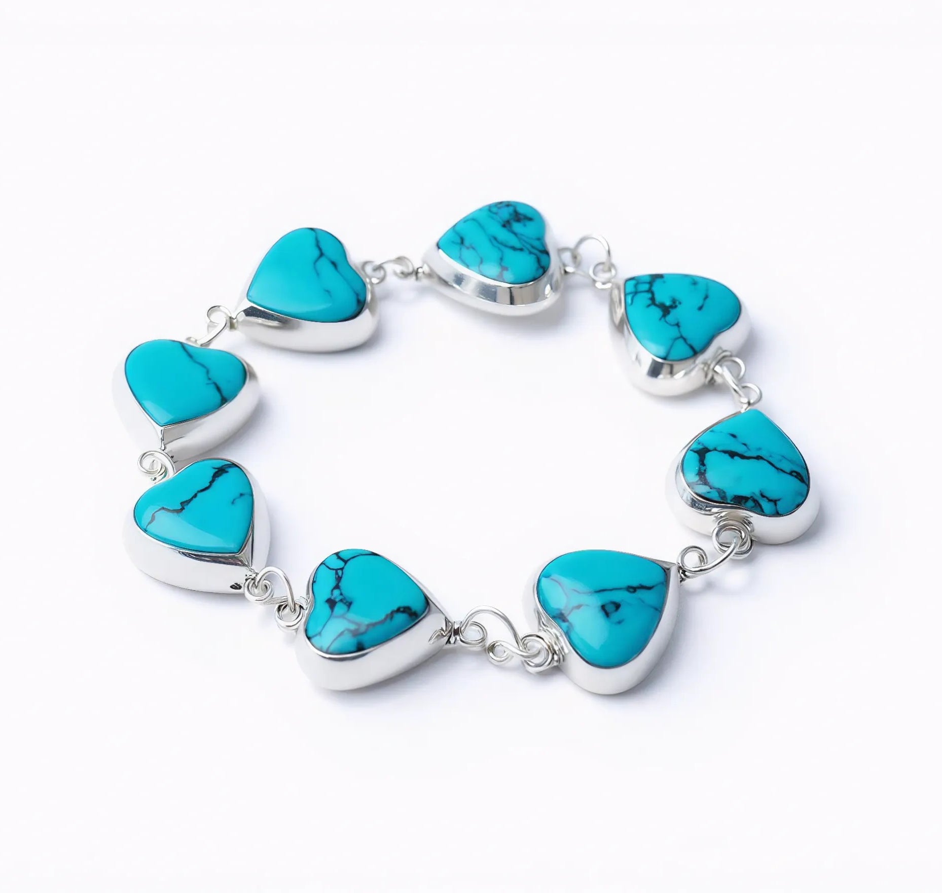 Heart of Heaven silver bracelet with eight Spider Turquoise heart stones, front view