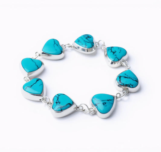 Heart of Heaven silver bracelet with eight Spider Turquoise heart stones, front view
