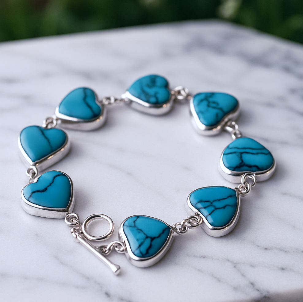 Close-up Heart of Heaven bracelet displaying Spider Turquoise texture and serene blue tones
