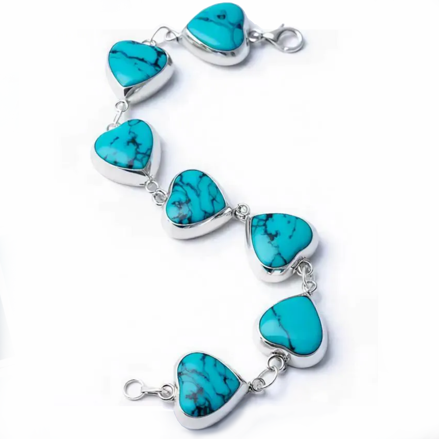 Detail macro Heart of Heaven bracelet highlighting turquoise heart precision and silver craftsmanship