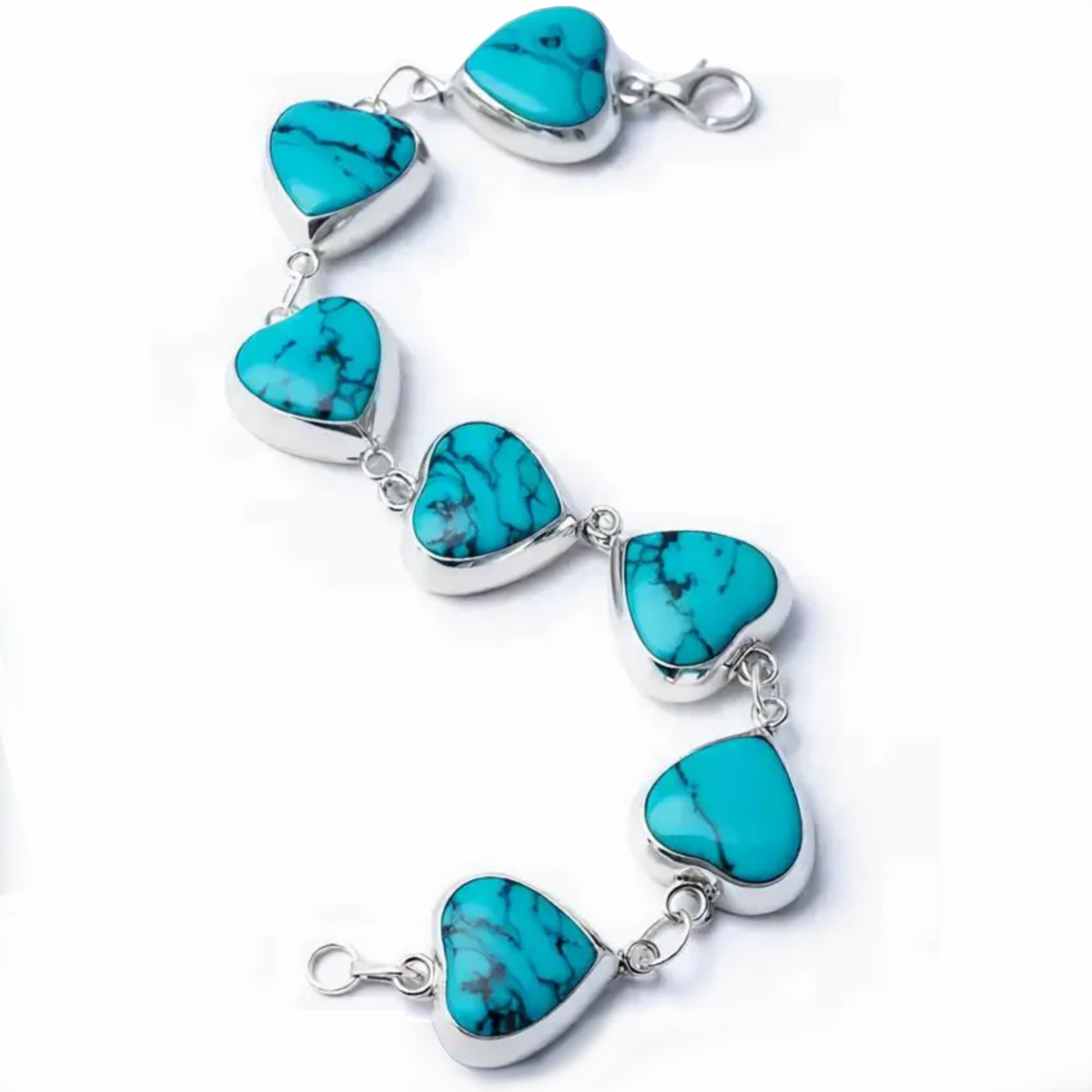Detail macro Heart of Heaven bracelet highlighting turquoise heart precision and silver craftsmanship