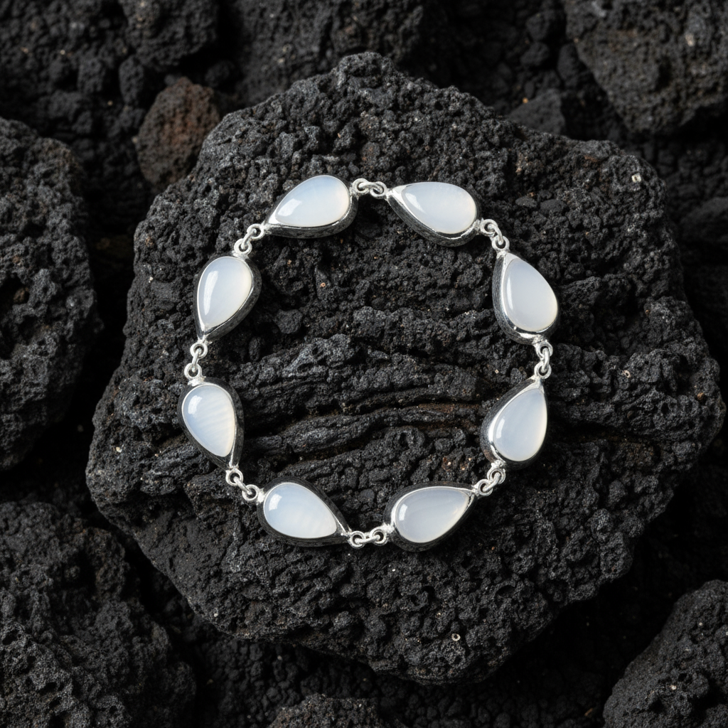 Side view Moon Drops bracelet highlighting moonlight shimmer and ocean serenity