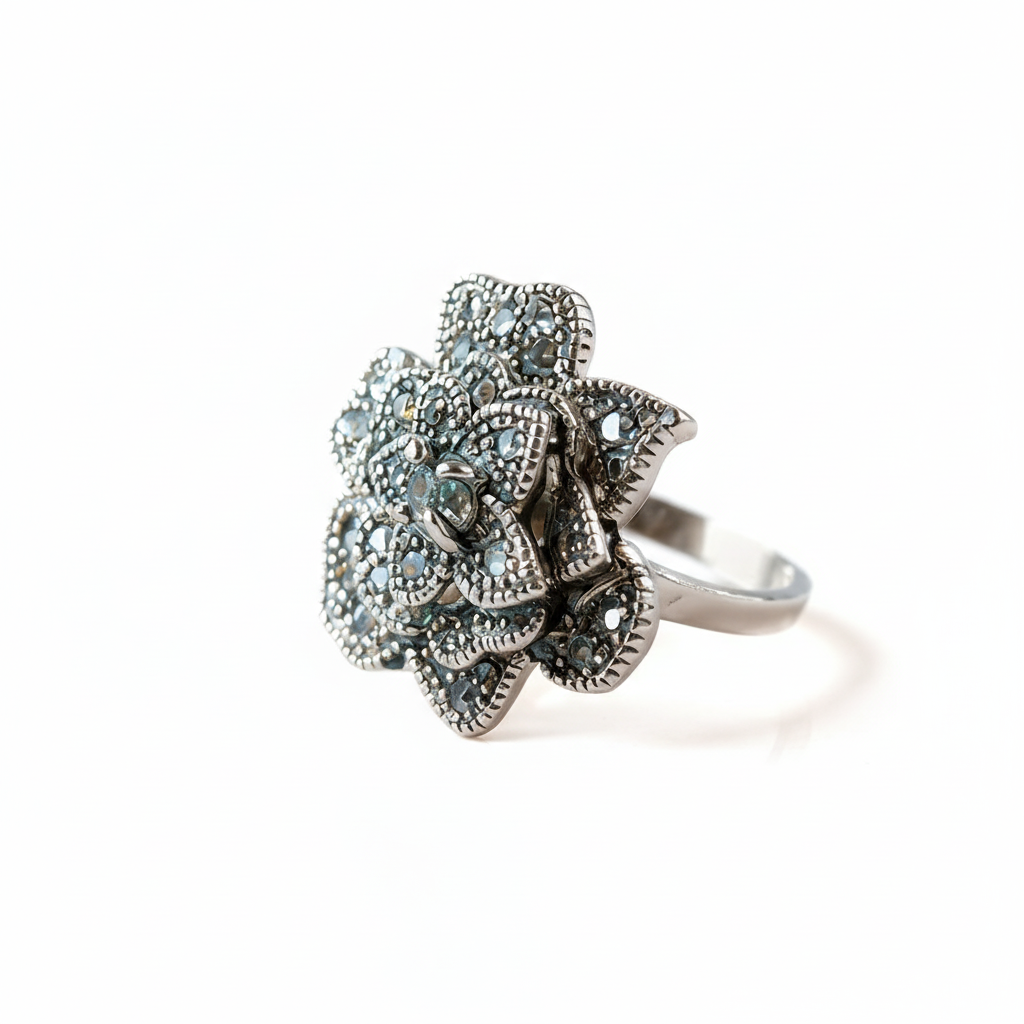 Moon Flower silver ring with three-dimensional relief flower design, front view