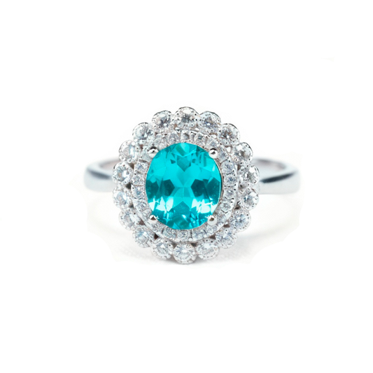 Ocean Flower green tourmaline halo ring with double zircon halos in rhodium silver, front view