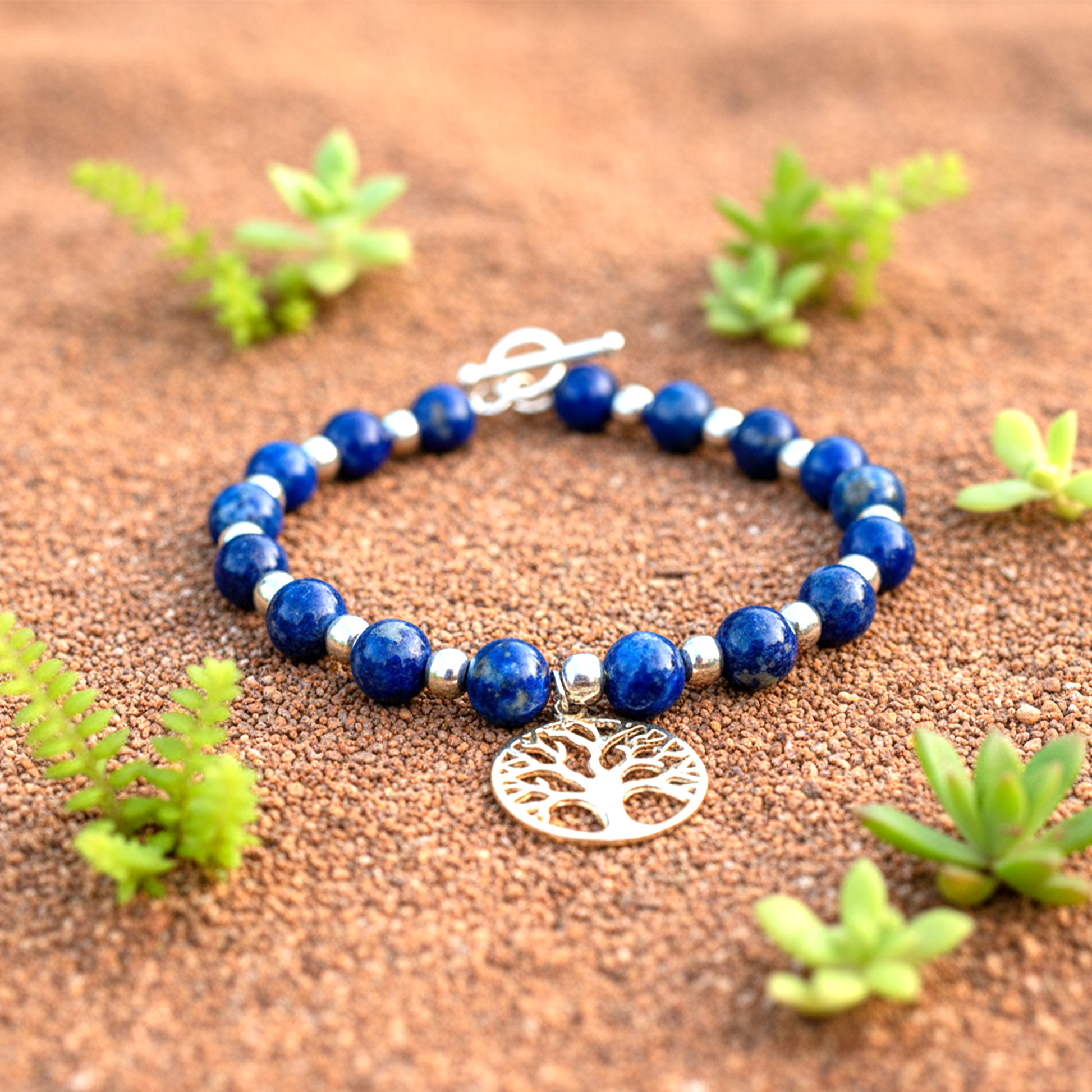 Side view Roots of Heaven bracelet highlighting Tree of Life centerpiece and wisdom stone