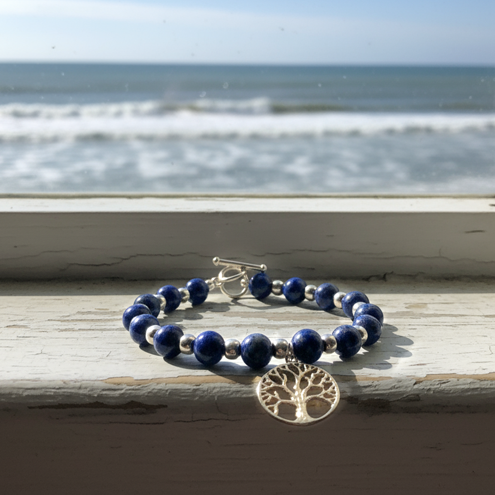 Roots of Heaven bracelet at angle showing grounding, growth and connection symbolism