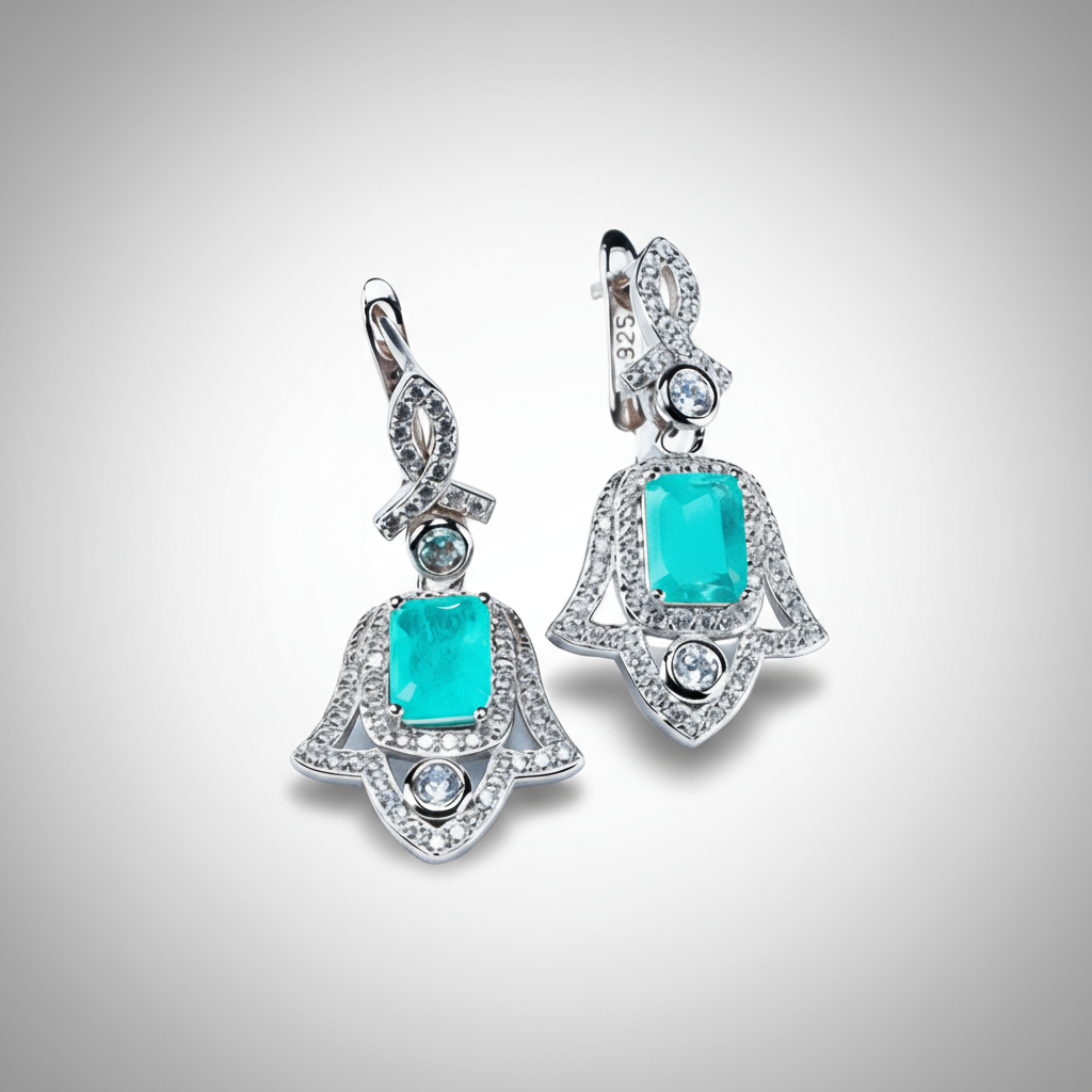 Side view Wings of Protection Hamsa earrings highlighting zircon sparkles and protection symbo