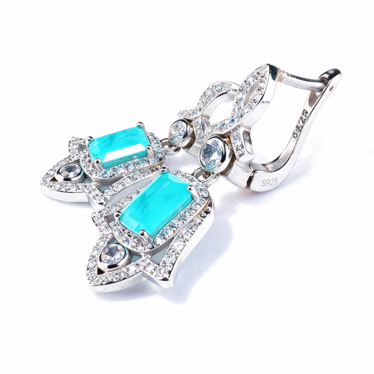 Artistic view Wings of Protection Hamsa earrings emphasizing spiritual protection and elegance