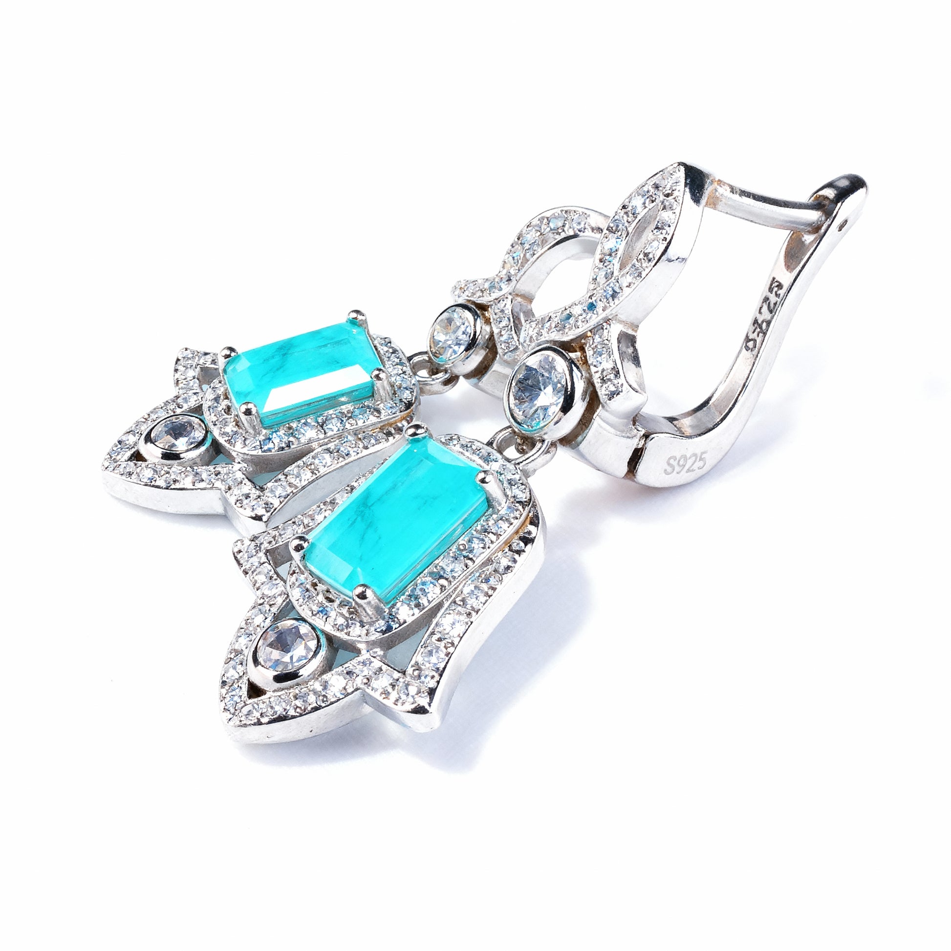 Artistic view Wings of Protection Hamsa earrings emphasizing spiritual protection and elegance