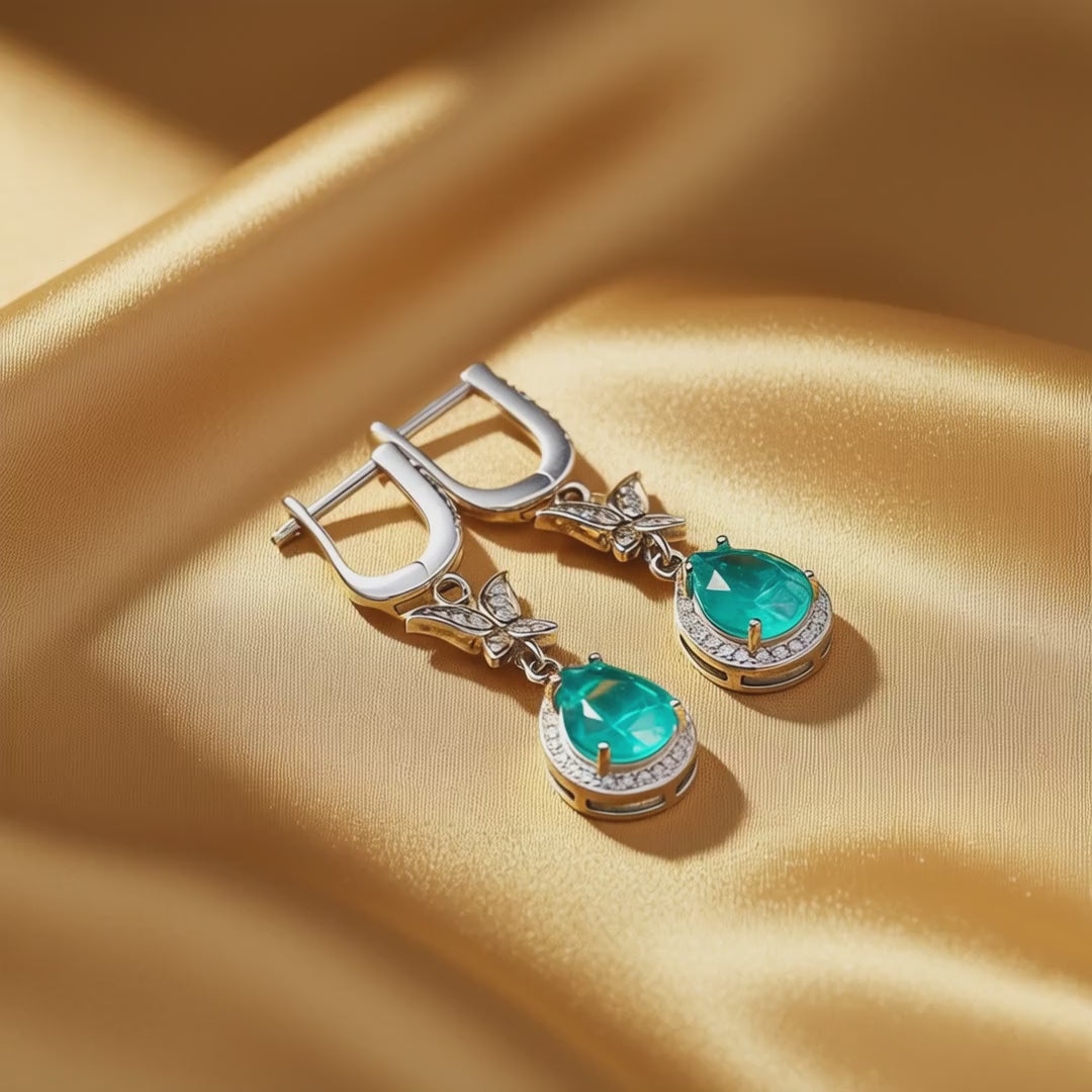 Metamorphosis rhodium silver earrings with green tourmaline and butterfly - product showcase video