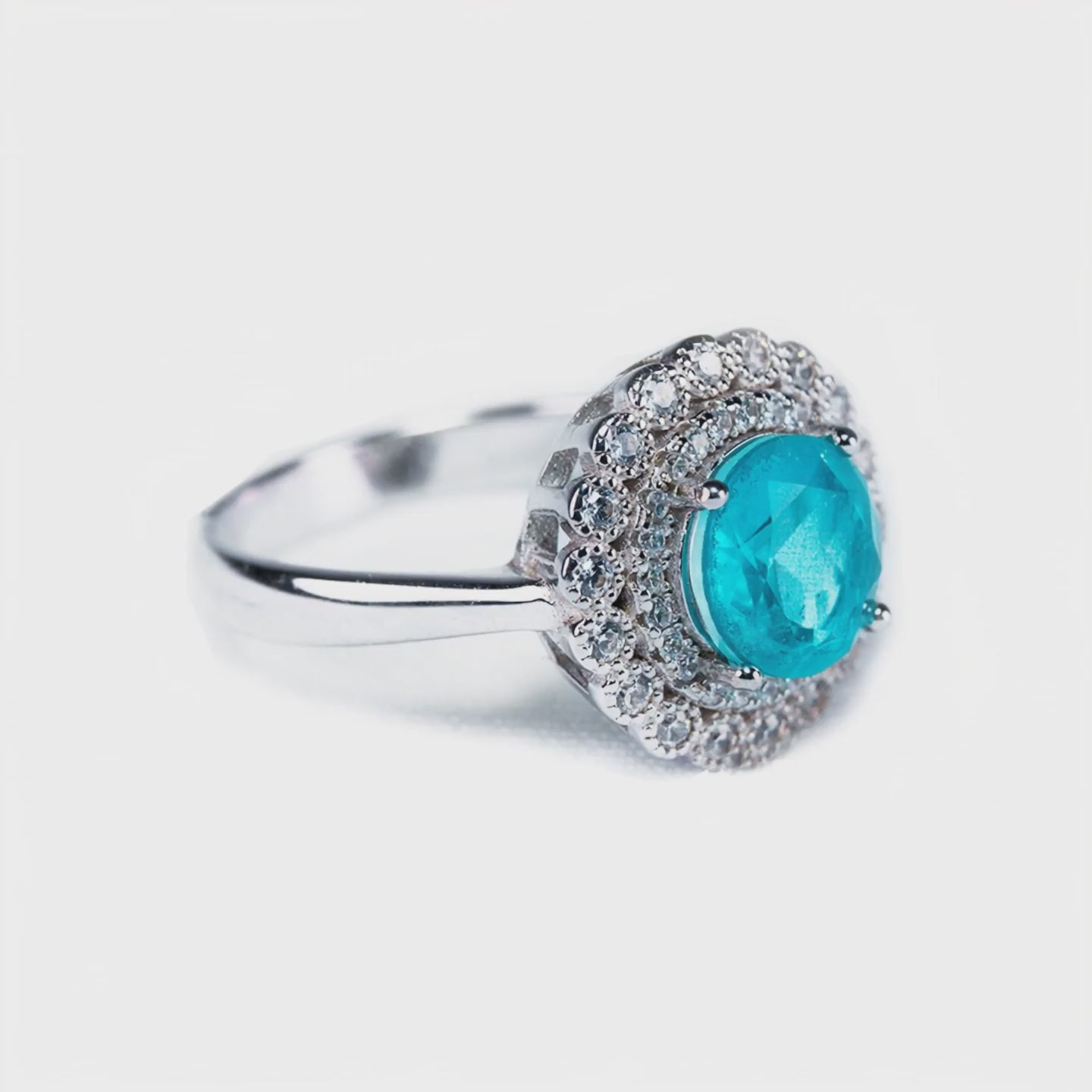 Ocean Flower green tourmaline halo ring with double zircon halos - product showcase video