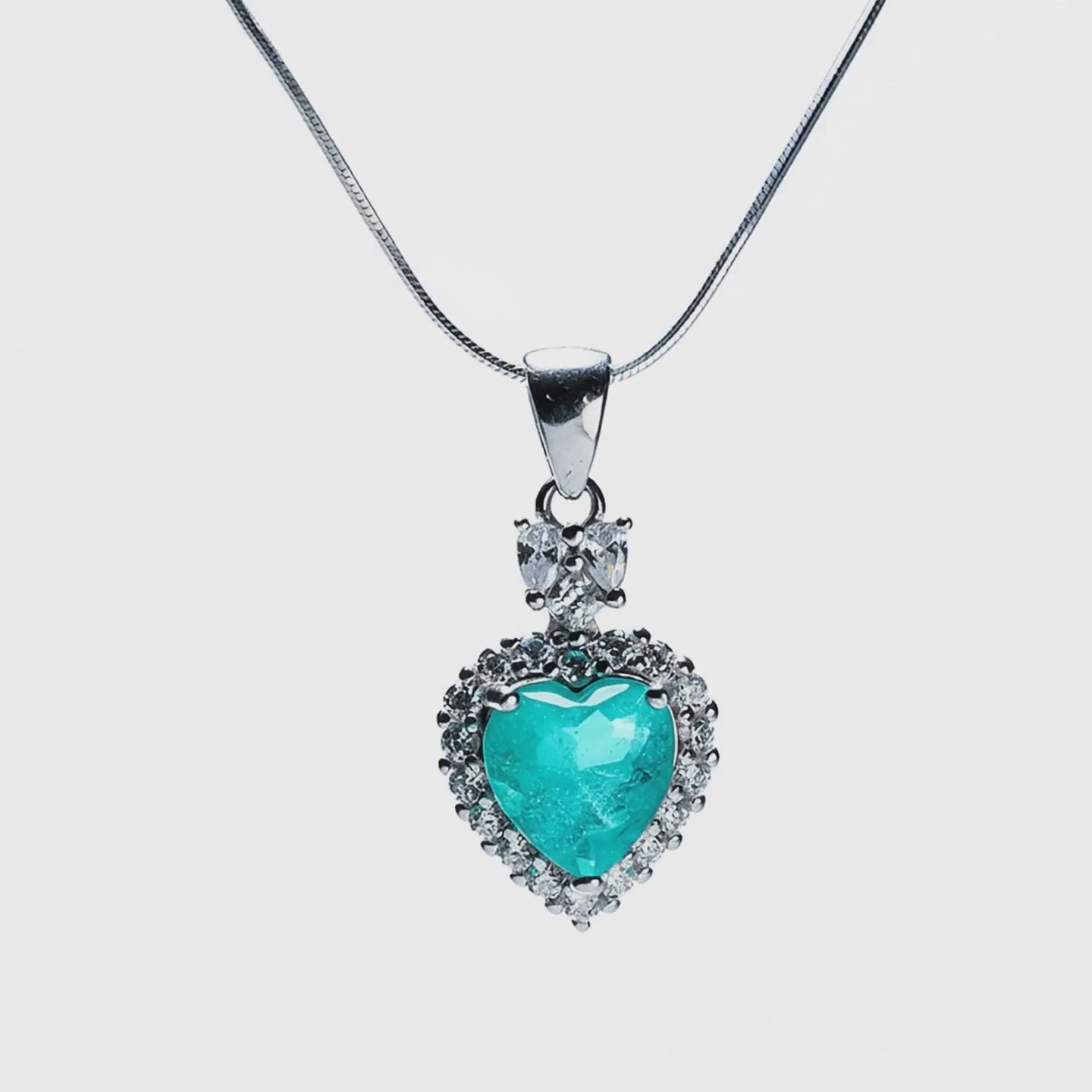 Sacred Heartbeat green tourmaline heart pendant with sparkling halo - product showcase video