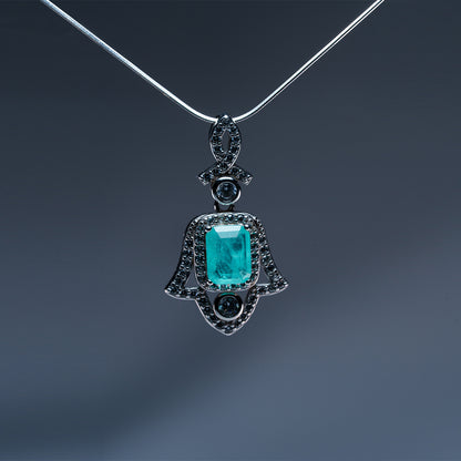 Amulet of Light pendant at angle showing sacred talisman symbolism and harmonizing energy