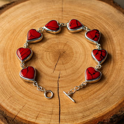 Close-up Heart of Fire bracelet displaying Red Spider Cat stone texture and vital energy