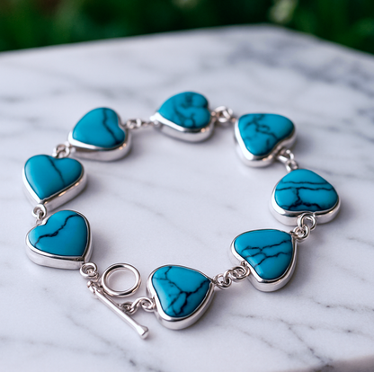 Close-up Heart of Heaven bracelet displaying Spider Turquoise texture and serene blue tones