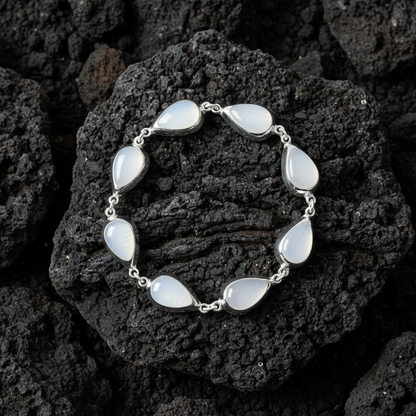 Side view Moon Drops bracelet highlighting moonlight shimmer and ocean serenity