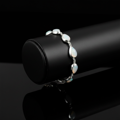 Close-up Moon Drops bracelet displaying shell purity and delicate craftsmanship
