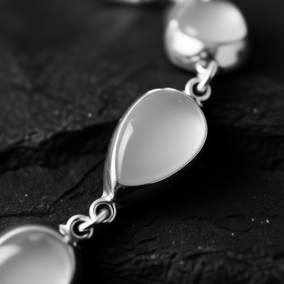 Close-up detail Moon Drops bracelet showing 925 sterling silver setting precision and ocean purity symbolism