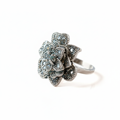 Moon Flower silver ring with three-dimensional relief flower design, front view