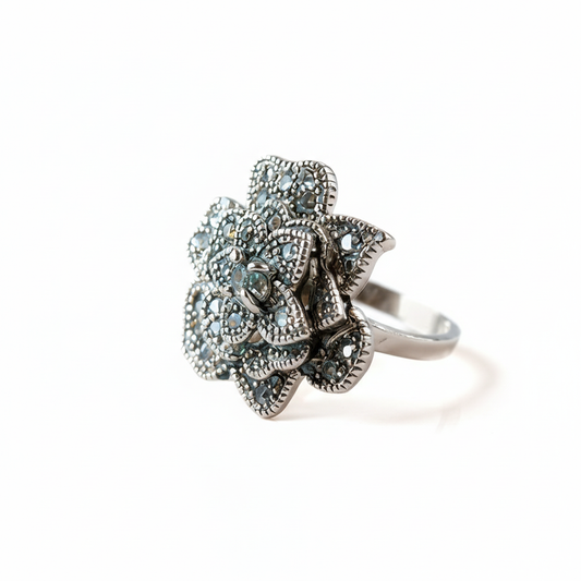 Moon Flower silver ring with three-dimensional relief flower design, front view