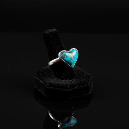 Artistic view Turquoise Heart ring emphasizing protection, healing and pure love symbolism